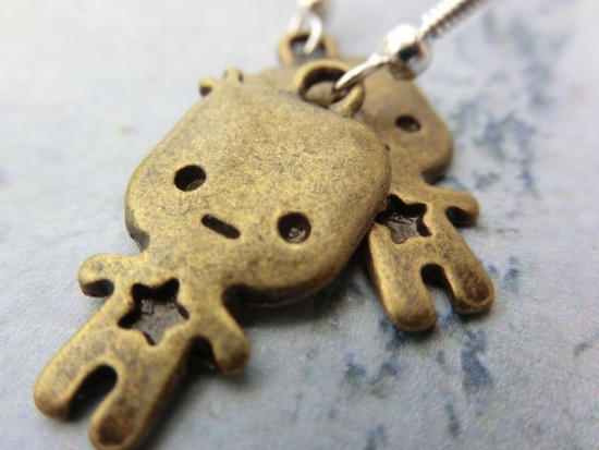 Preview: Figur Ohrringe Männchen bronzefarben Stern Star